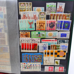 Lot massif de timbres de France oblitérés en 12 albums.