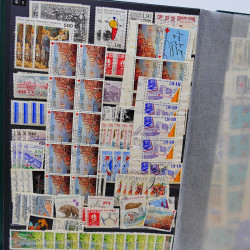 Lot massif de timbres de France oblitérés en 12 albums.
