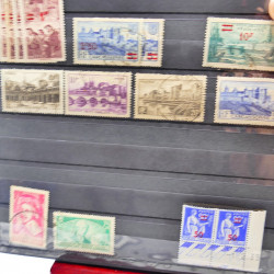 Lot massif de timbres de France oblitérés en 12 albums.