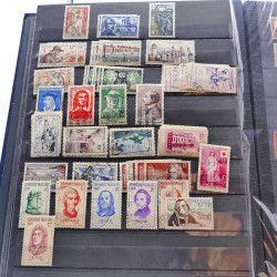 Lot massif de timbres de France oblitérés en 12 albums.