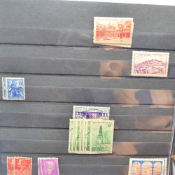 Lot massif de timbres de France oblitérés en 12 albums.