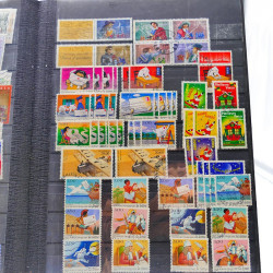 Lot massif de timbres de France oblitérés en 12 albums.