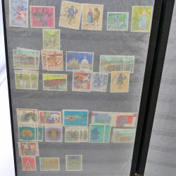 Lot massif de timbres de France oblitérés en 12 albums.