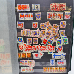 Lot massif de timbres de France oblitérés en 12 albums.