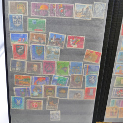 Lot massif de timbres de France oblitérés en 12 albums.