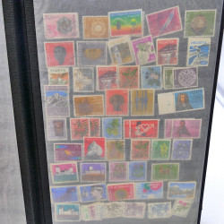 Lot massif de timbres de France oblitérés en 12 albums.