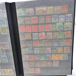 Lot massif de timbres de France oblitérés en 12 albums.