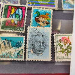 Lot massif de timbres de France oblitérés en 12 albums.
