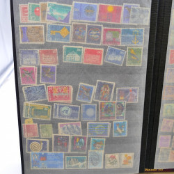Lot massif de timbres de France oblitérés en 12 albums.