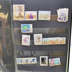 Lot massif de timbres de France oblitérés en 12 albums.