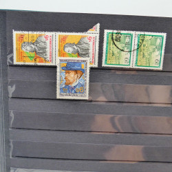 Lot massif de timbres de France oblitérés en 12 albums.