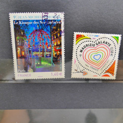 Lot massif de timbres de France oblitérés en 12 albums.