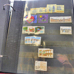Lot massif de timbres de France oblitérés en 12 albums.