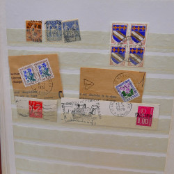 Lot massif de timbres de France oblitérés en 12 albums.