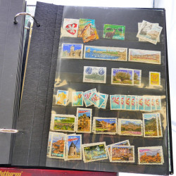 Lot massif de timbres de France oblitérés en 12 albums.