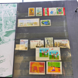 Lot massif de timbres de France oblitérés en 12 albums.