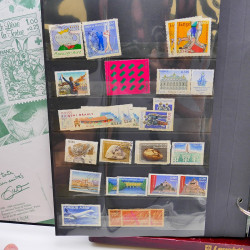 Lot massif de timbres de France oblitérés en 12 albums.