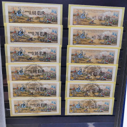 Lot massif de timbres de France oblitérés en 12 albums.