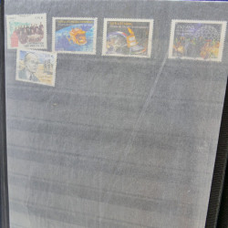 Lot massif de timbres de France oblitérés en 12 albums.