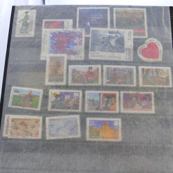 Lot massif de timbres de France oblitérés en 12 albums.