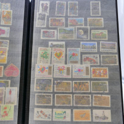 Lot massif de timbres de France oblitérés en 12 albums.
