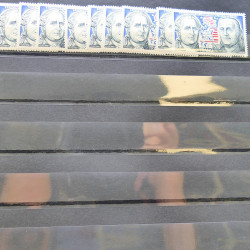 Lot massif de timbres de France oblitérés en 12 albums.
