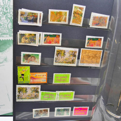 Lot massif de timbres de France oblitérés en 12 albums.