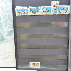 Lot massif de timbres de France oblitérés en 12 albums.