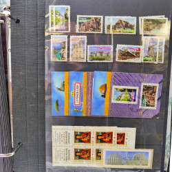 Lot massif de timbres de France oblitérés en 12 albums.