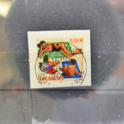 Lot massif de timbres de France oblitérés en 12 albums.