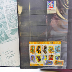 Lot massif de timbres de France oblitérés en 12 albums.