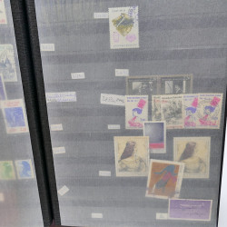 Lot massif de timbres de France oblitérés en 12 albums.