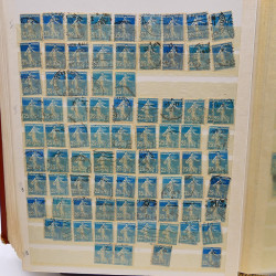 Lot massif de timbres de France oblitérés en 12 albums.