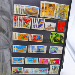 Lot massif de timbres de France oblitérés en 12 albums.