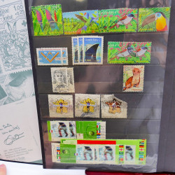 Lot massif de timbres de France oblitérés en 12 albums.