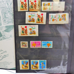 Lot massif de timbres de France oblitérés en 12 albums.