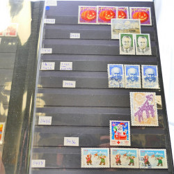Lot massif de timbres de France oblitérés en 12 albums.