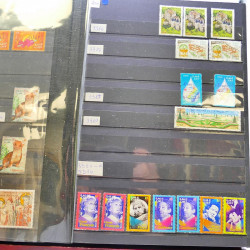 Lot massif de timbres de France oblitérés en 12 albums.