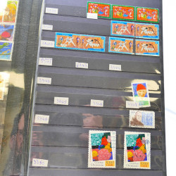 Lot massif de timbres de France oblitérés en 12 albums.