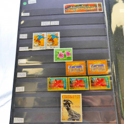 Lot massif de timbres de France oblitérés en 12 albums.