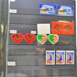 Lot massif de timbres de France oblitérés en 12 albums.