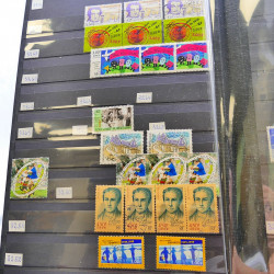 Lot massif de timbres de France oblitérés en 12 albums.