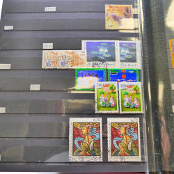 Lot massif de timbres de France oblitérés en 12 albums.