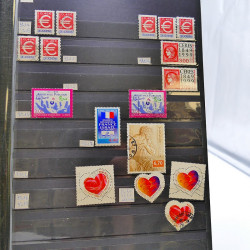 Lot massif de timbres de France oblitérés en 12 albums.