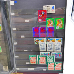 Lot massif de timbres de France oblitérés en 12 albums.