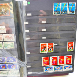 Lot massif de timbres de France oblitérés en 12 albums.