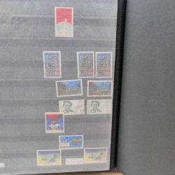 Lot massif de timbres de France oblitérés en 12 albums.