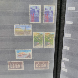 Lot massif de timbres de France oblitérés en 12 albums.