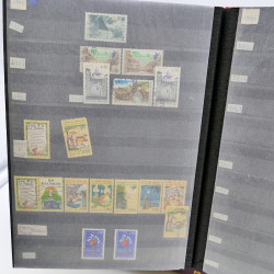 Lot massif de timbres de France oblitérés en 12 albums.