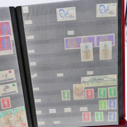 Lot massif de timbres de France oblitérés en 12 albums.
